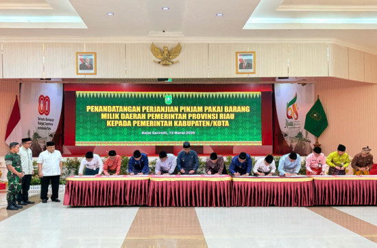 Bupati Kampar Hadiri Penandatanganan Perjanjian Pinjam Pakai BMD Pemprov Riau untuk Gerai Koperasi Merah Putih