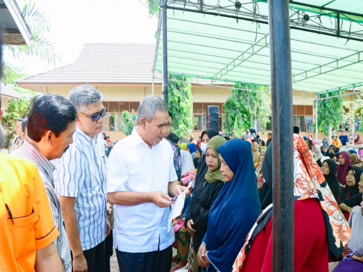Launching Perdana Program Penyaluran Beras KPM 2023, Pj Bupati Kampar  : Sebanyak 48.828 KPM Kampar Akan terima Bantuan Beras. 