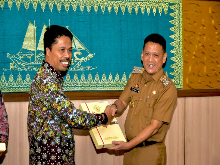Pj Bupati Kampar Terima Laporan Hasil Pemeriksaan PAD dari BPK RI Perwakilan Riau. 