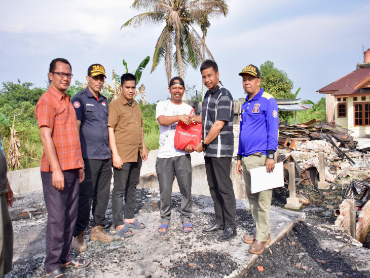 Peduli Masyarakat terhadap Bencana, Pj Sekda Kampar Salurkan Bantuan di Kecamatan Tambang.