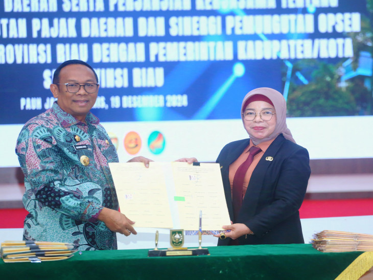 Pj. Sekda Kampar Hadiri High Level Meeting Elektronifikasi Sekaligus Tandatangani Mou Terkait Optimalisasi Pemungutan Pajak Daerah