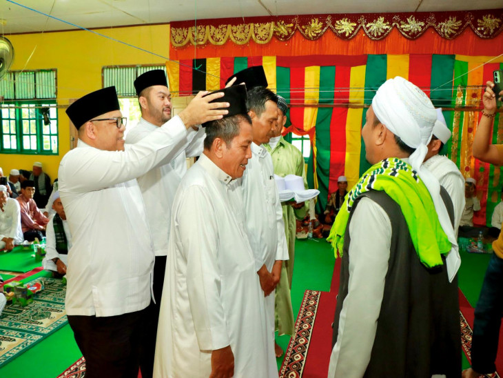 Plt. Kadis Kominfo Kab. Kampar Zulfikar, S.Ag, M.Si Hadiri Tabligh Akbar Penutupan Khalwat/Suluk Daerah Ke-54 dan Haul Ke-74 Syekh Ja’afar Khatib Rajo Lelo Desa Koto Mesjid