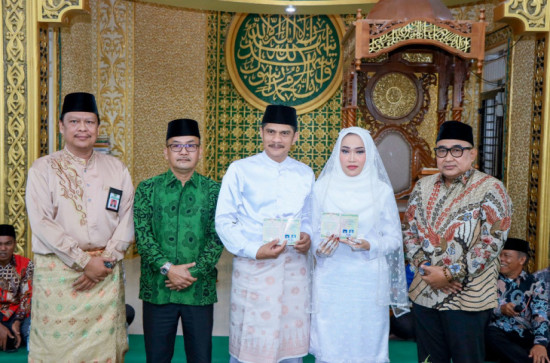 Jadi Saksi Pernikahan, Pj. Bupati Kampar Katakan Kemajuan Bangsa Bermula Dari Terciptanya Keluarga Yang Berkualitas dan Agamis