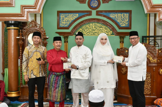 Jadi Saksi Nikah, Pj Bupati Kampar Sampaikan Selamat Kepada Annisak Nuzul dan Bayu Irawan,ST