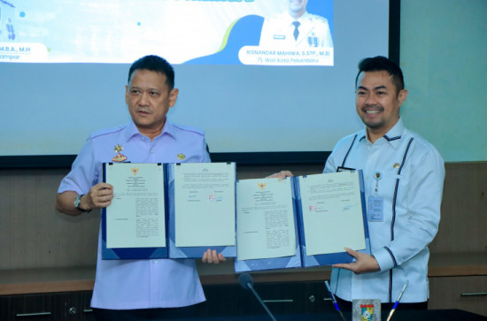 Perkuat Sinergitas dan Kerja Sama, Pemkab Kampar dan Kota Pekanbaru Tandatangani MoU. 