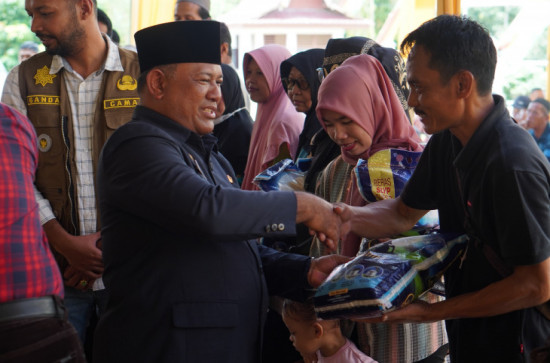 Penjabat Bupati Kampar Hadiri Acara Rapat Anggota Tahunan (RAT) Koperasi Setia Kawan.