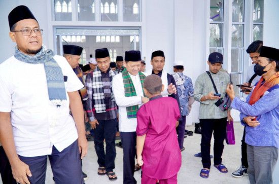 Pj Bupati Kampar Lepas Ziarah Kubur Pada Aghi Ghayo Onam Desa Kampung Godang, Hambali : “Ini Adalah Kegiatan Silaturahmi Terbesar.”