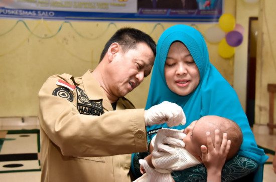 Canangkan Pekan Imunisasi Nasional Polio, Pj Bupati Kampar Mengajak Seluruh Pihak Untuk Mensukseskan Pelaksanaan PIN Polio, Dengan Target Mencapai 95%.
