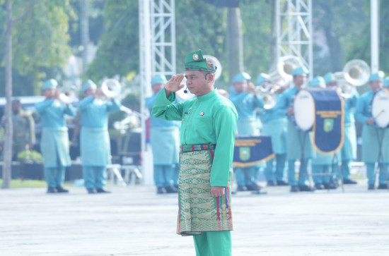 Bupati Kampar Jadi Komandan Upacara Peringatan Hari Jadi Ke-68 Provinsi Riau Tahun 2025.