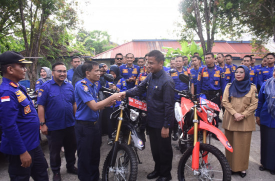 Serahkan 1 Unit Mobil dan 2 Unit Sepeda Motor  Penyelamatan, Bupati Kampar Berharap Pelayanan Kepada Masyarakat Makin Baik dan Lebih Optimal.
