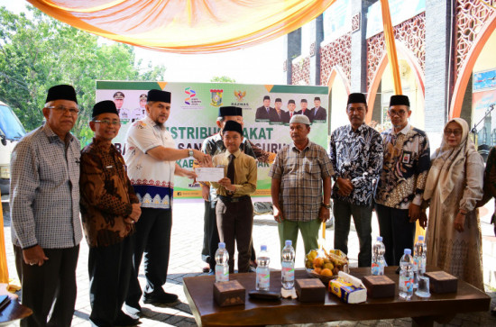 Sebanyak 1686 Orang Penerima Zakat, Staf Ahli Riadel Fitri: Ini Wujud Nyata Pemerintah Dalam Mendukung Kemajuan Pendidik dan pendidikan agama di Daerah.
